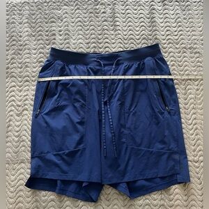 Lulu Lemon- men’s athletic shorts, color blue, size large.